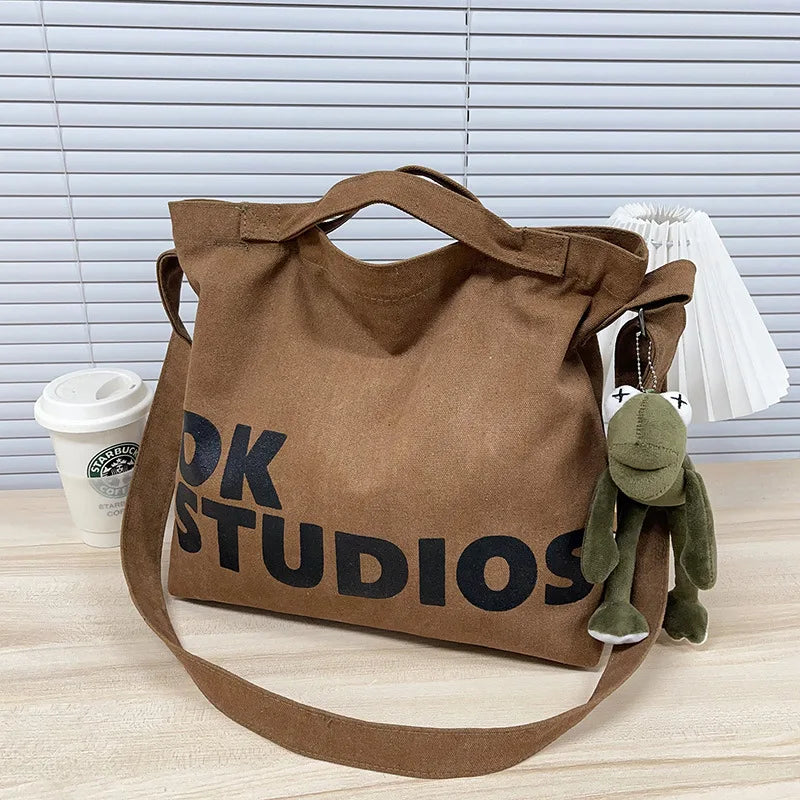Nouveau sac en toile épaissie délavée, sac à main coréen pour femmes, sacs à provisions de grande capacité pour femmes, sacs d'école pour étudiants